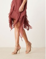bow heeled sandals in gold